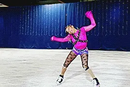 starr andrews doing choreography like whipping her head and waving her body