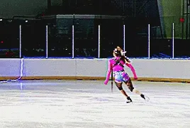 starr andrews doing a double axel jump